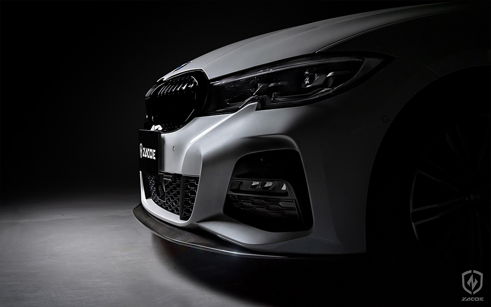 Carbon fiber front lip installed on BMW G20 320i Sedan.