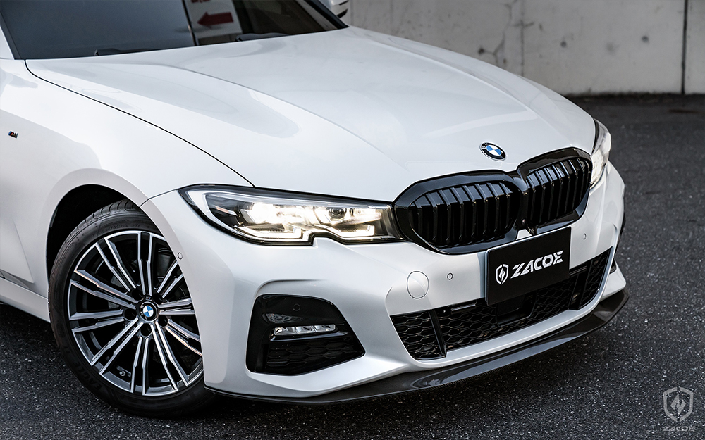 Carbon fiber front lip installed on BMW G20 320i Sedan.
