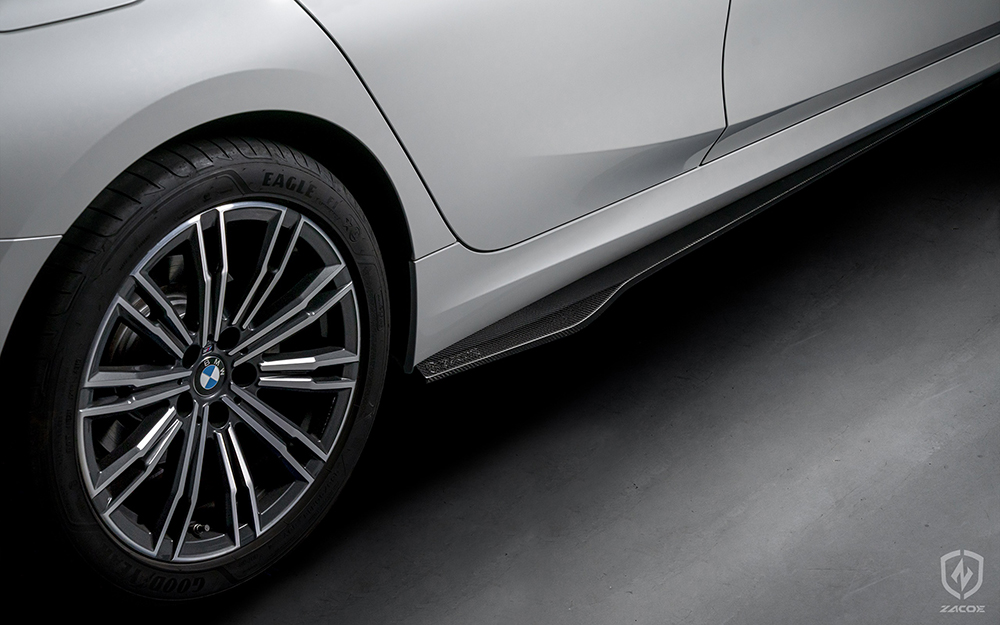 Carbon fiber side skirt installed on BMW G20 320i Sedan.
