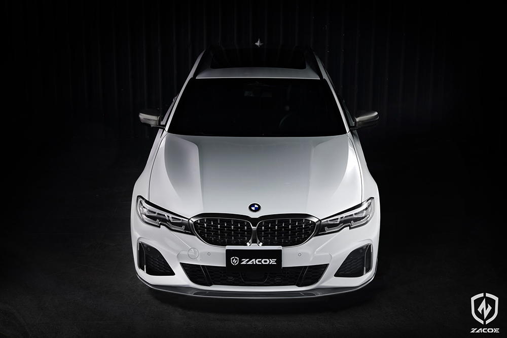 Carbon fiber front lip installed on BMW G21 M340i Touring.