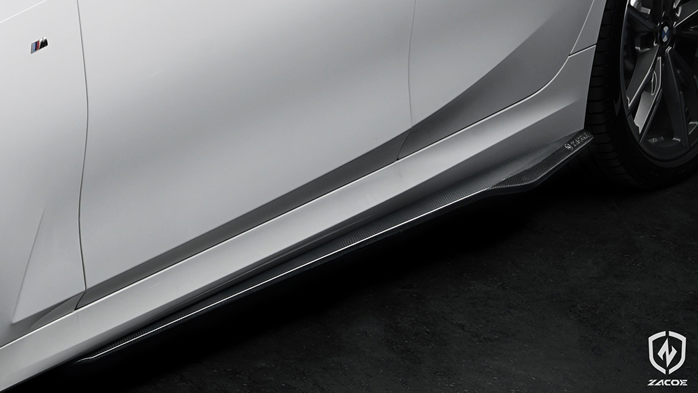 Carbon fiber side skirt installed on BMW G21 M340i Touring.