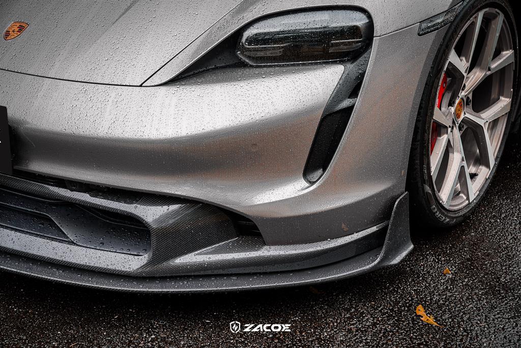 Carbon fiber front lip installed on a grey Porsche Taycan Sedan