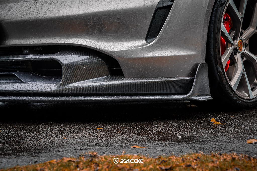 Carbon fiber front lip installed on a grey Porsche Taycan Sedan